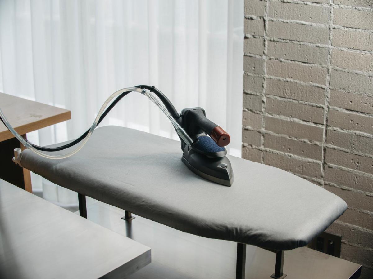 Zentis Osaka Hotel Exterior photo A steam iron on an ironing board